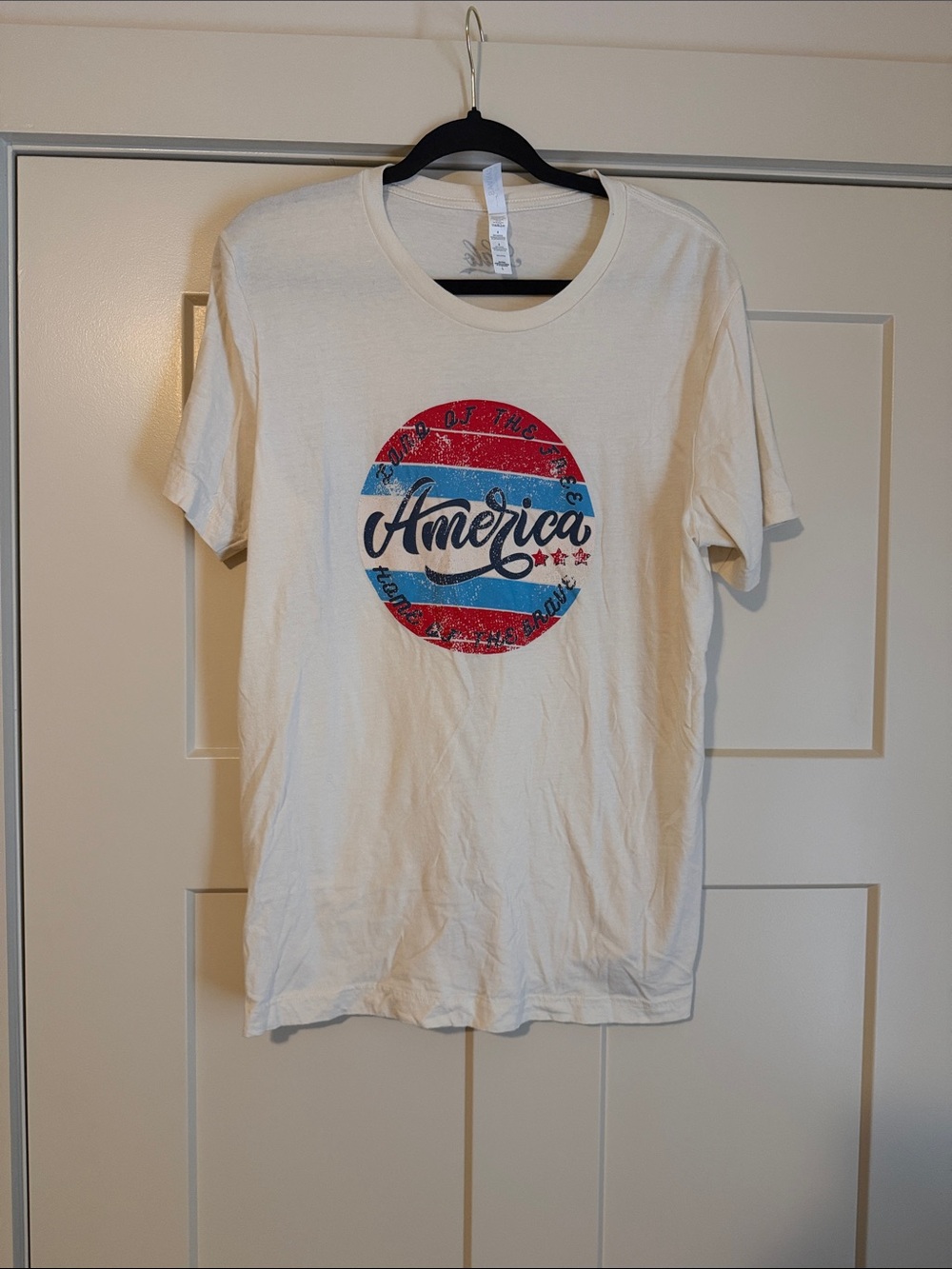 America Graphic Tee - Cream with Red & Blue Logo